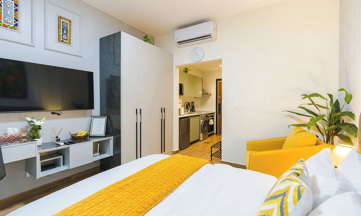 Dzorwulu Apartment | Modern Studio Apt with Balcony near Airport in Accra with AC, Pool + Gym access