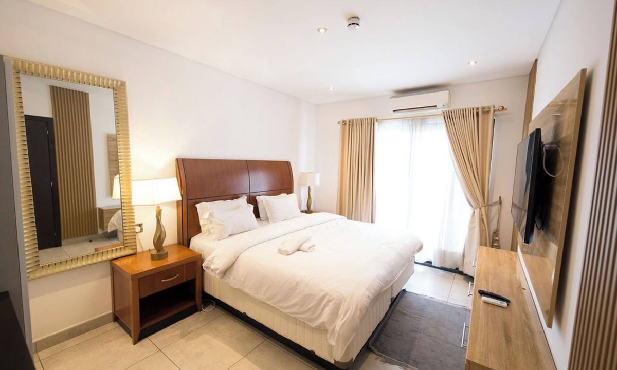 Accra Apartment | The Signature Apartment Unit A407-Charming 2-bedroom in Accra with AC, Free WiFi