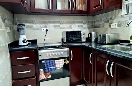 Adenta Apartment | Charming, Quiet & Cozy - Close to Highway,Parking