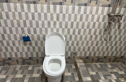 Nungua Apartment | Deluxe Kingsize Bedroom In Tema