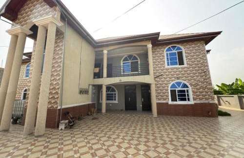 Nungua Apartment | Deluxe Kingsize Bedroom In Tema