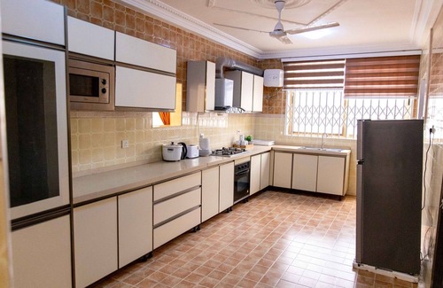 Nungua Apartment | Family sized house with a summer hut for outdoor sitting