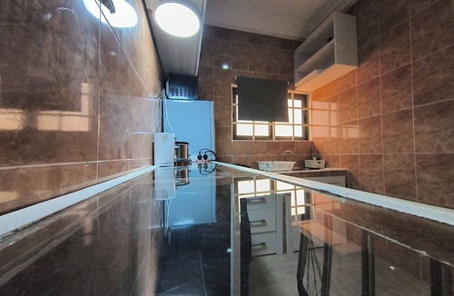 Prampram Apartment | 2-bedroom apartment in Accra with fitness room, WiFi, AC with a balcony views