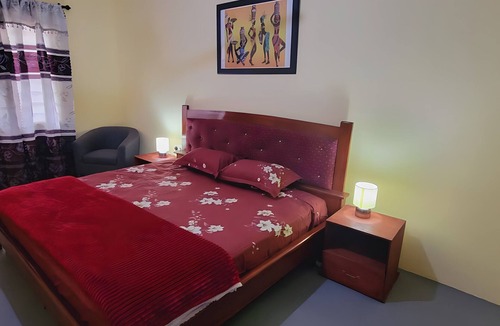 Winneba House | 25 minutes to Winneba Beach! A quiet family suite with dining and living area.