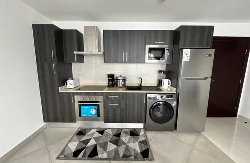 Cantonments Apartment | Cozy 2-bedroom Apartment with WiFi and fitness room in charming Accra