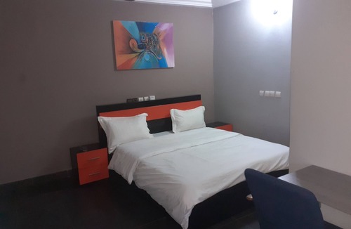 Lome House | Deluxe Double Bed Bedroom in Lome