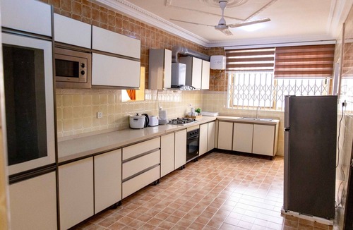 Nungua Apartment | Family sized house with a summer hut for outdoor sitting