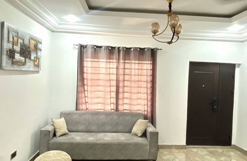 Santeo Apartment | Lucy’s Lounge, Cozy 2-bedroom apartment in East Legon Hills