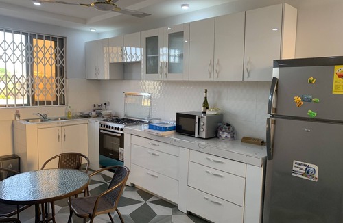 Cape Coast Bed & Breakfast | Modern 2 bed apartment with balcony, kitchen and air-con. Close to castle tours