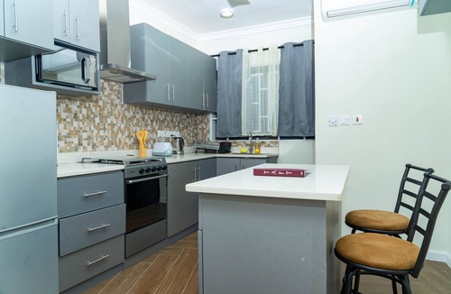 Amrahia Apartment | Modern 2-Bedroom Apartment Home on a Gated Compound with Backup Solar Power.