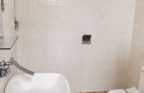 Koforidua Hotel | Pleasant 1-bedroom Queen with AC in vibrant Koforidua