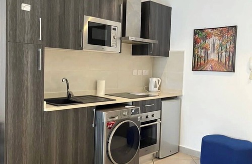 Cantonments House | Sleek & Stylish Studio Apartment at Embassy Gardens – Prime Accra Living