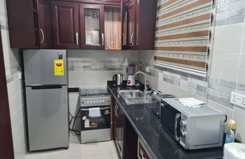 Adenta Apartment | Spacious, Quiet & Cozy- Close to Highway-Parking