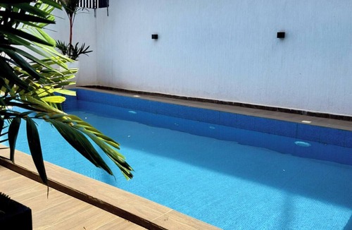 Osu Apartment | Stylish 1BR Apartment in Cantonments with Pool, Gym & Rooftop Lounge