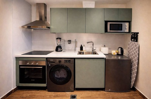 Dzorwulu Apartment | Stylish Airport Residential Studio | Pool & Gym