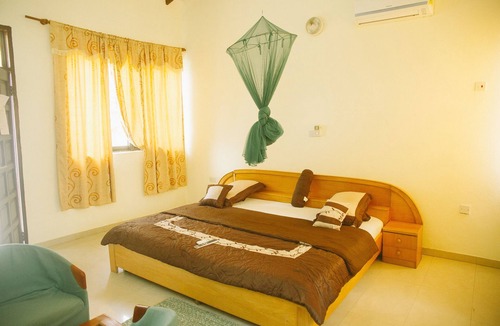 Beyin Ski Chalet | Tenack Beach Resort - Nzulezu