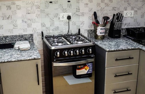 Kwabenyan Apartment | Tina's Court is a charming 2-bedroom apartment in Ashongman Estate, Accra Ghana