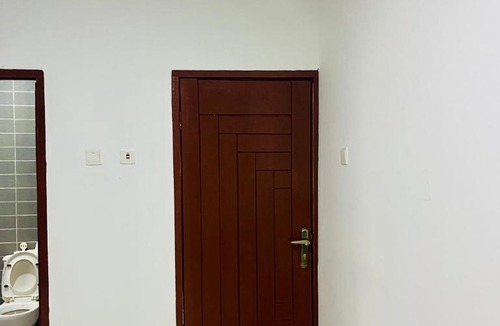 Oyibi Apartment | Vienna City Pub Apartment Ghana