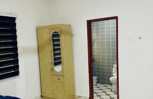 Oyibi Apartment | Vienna City Pub Apartment Ghana