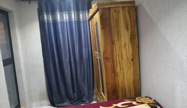 Appartement Luxueux à Deux pas de Colombe de la Paix:netflix,wifi, eau Chaude in Lomé