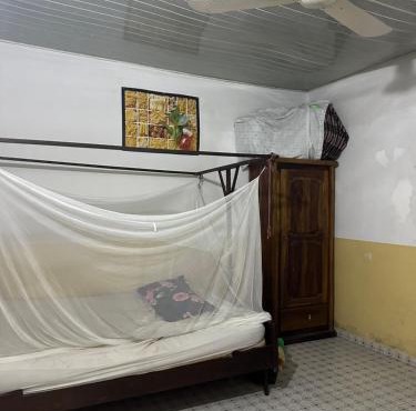 Chambre Privée dans une maison togolaise in Kpalimé