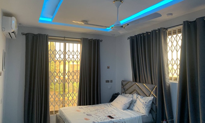 Cape Coast Bed & Breakfast | Modern 2 bed apartment with balcony, kitchen and air-con. Close to castle tours