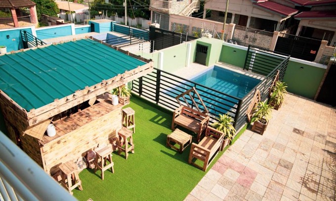 Taifa Villa | Spacious Afrocentric 5BDR villa outdoor bar & pool
