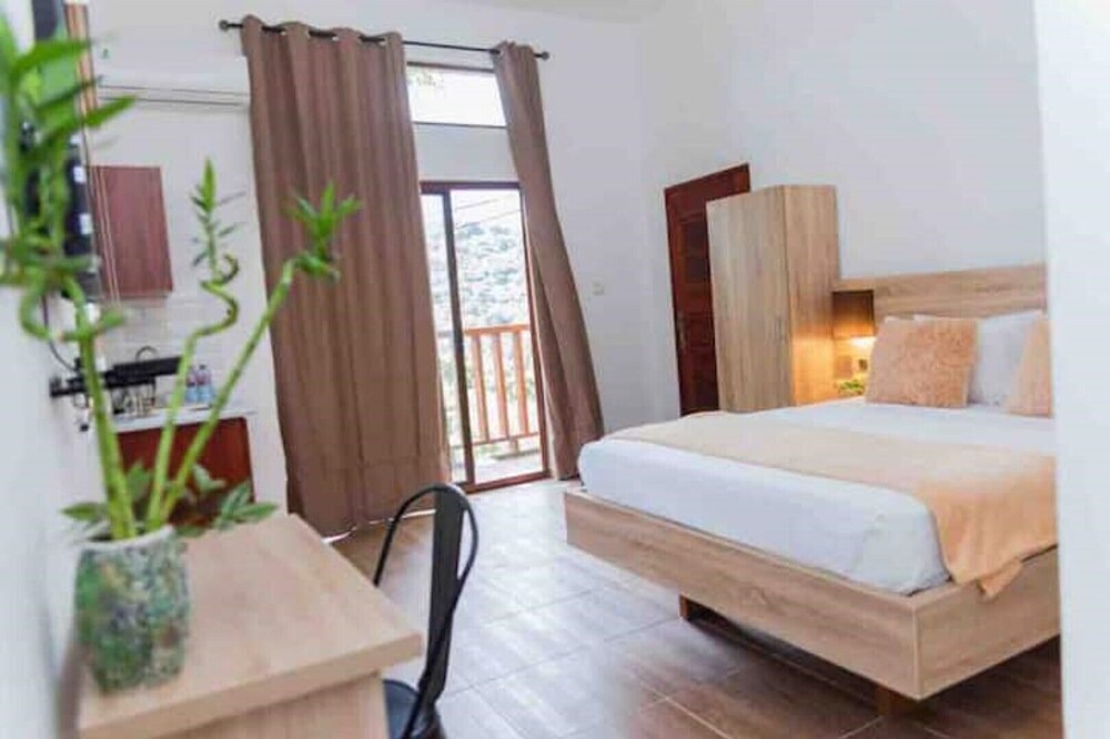 Aburi Apartment | The Treehouse Studio apartments with a large rooftop terrace.