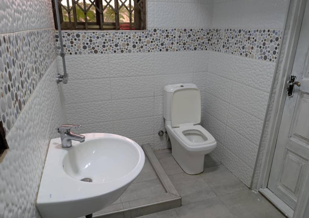 Taifa Apartment | Orange wood home