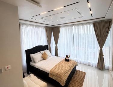 One-Bedroom Apartment with Balcony and City View