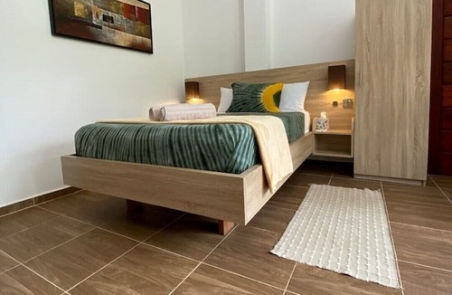 Aburi Apartment | The Treehouse Studio apartments with a large rooftop terrace.