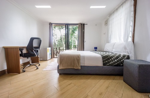 Aburi Apartment | The Treehouse Studio apartments with a large rooftop terrace.