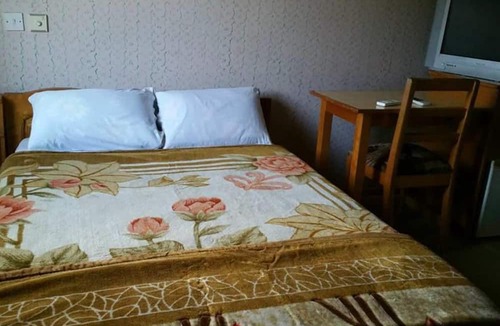 Ampenyi Hotel | Alberta's Palace Beach Resort