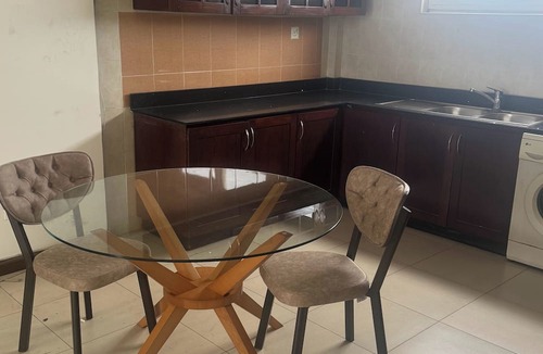 Roman Ridge Apartment | Modern Furnished 1BR in Roman Ridge w/Rooftop Views & Near to Airport Area