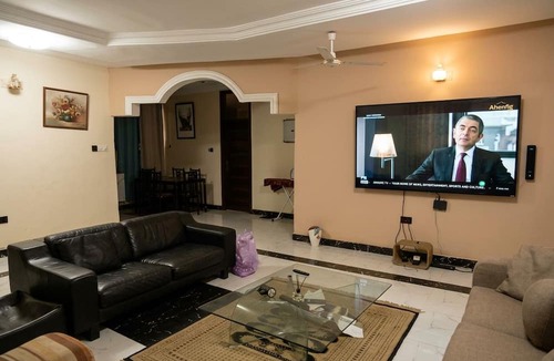 Tema House | A Downtown Gbetsile Studio Balcony + King Bed