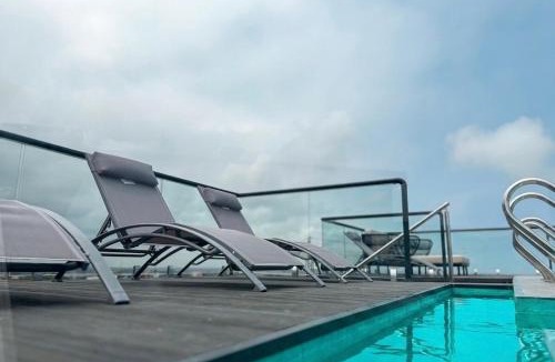 Bono East Region Apartment | Modern 1BR at Floria Residence
