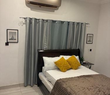 Kwabenyan Apartment | Parking Yard- Comfortable space Heritage Comfort