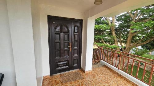 Taifa Apartment | Orange wood home