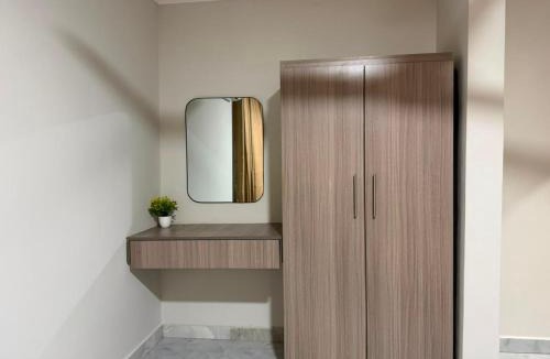 Madina Apartment | Coconut Gardens