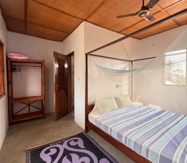 Kpalime House | Les Chambres du Jardin Tropical