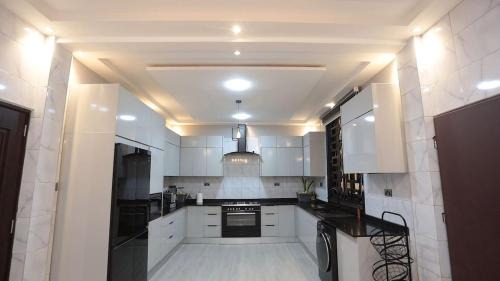 Adenta Villa | Modern Palm Villa New Legon Gated Retreat
