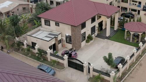 Adenta Villa | Modern Palm Villa New Legon Gated Retreat