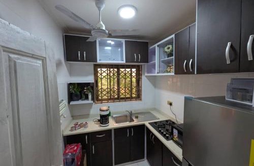 Taifa Apartment | Orange wood home