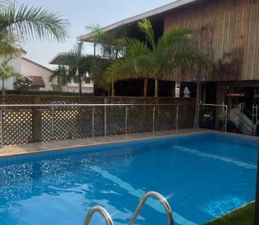 Teshie Hotel | Deluxe Balcony Room in East Legon with Free Breakfast & Gym Access