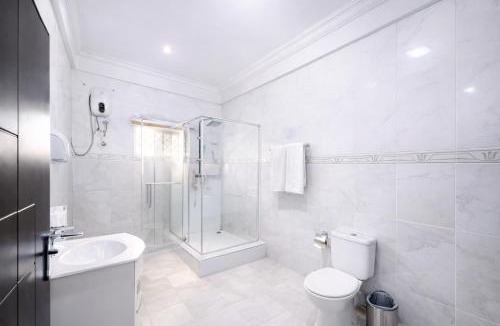 Teshie Hotel | Deluxe Balcony Room in East Legon with Free Breakfast & Gym Access