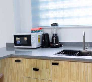 Tema Apartment | Atom Height Apartments