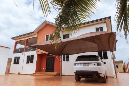 Your Perfect 5-Bedroom Getaway In Prampram in Prampram